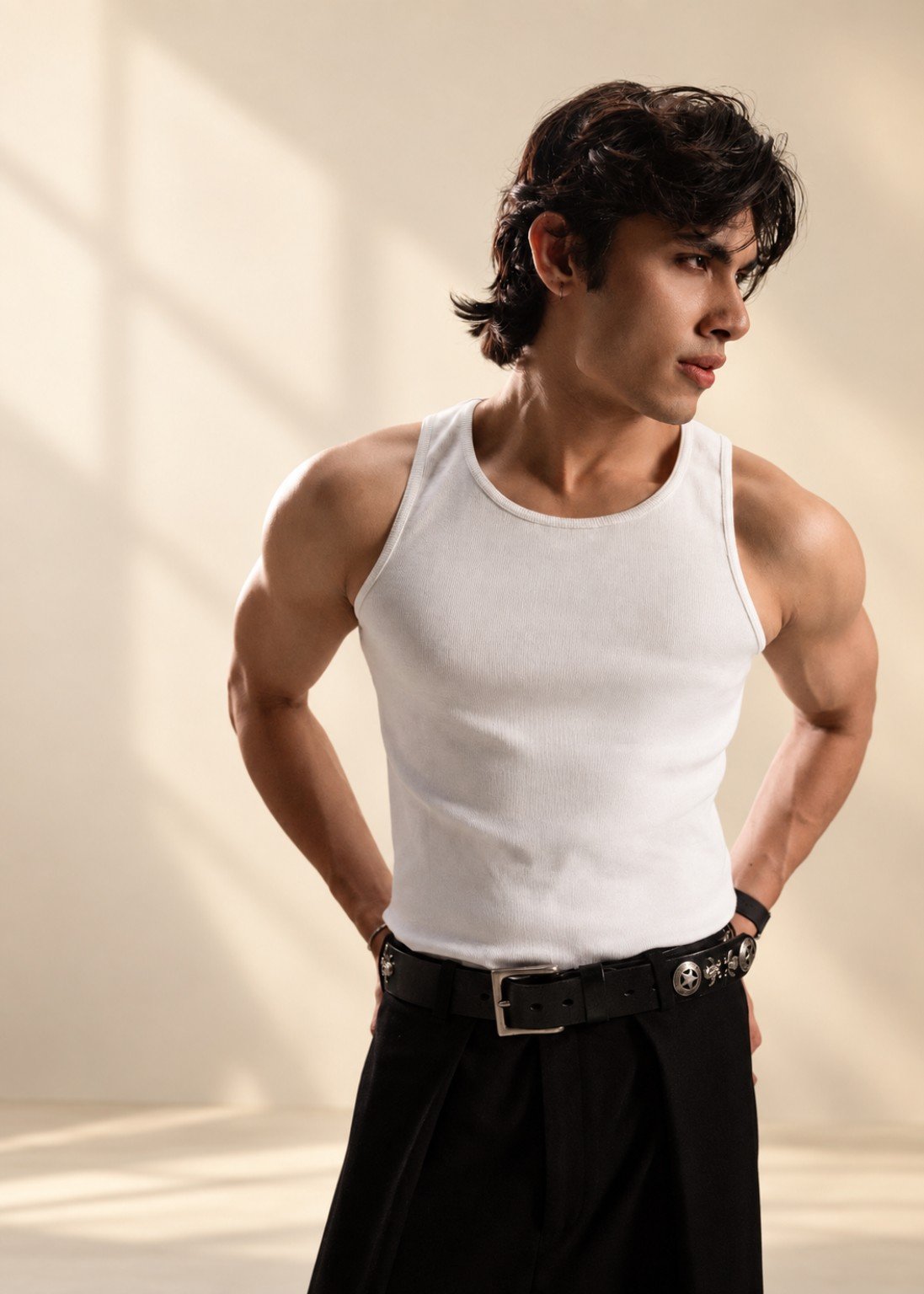 AURIEL model in a white tank top in warm natural light